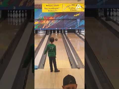 Kid makes impossible bowling trick shot look easy!
